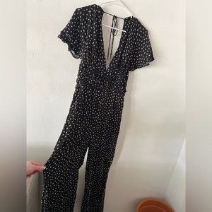 AFRM Jumpsuit. Open back, deep plunge